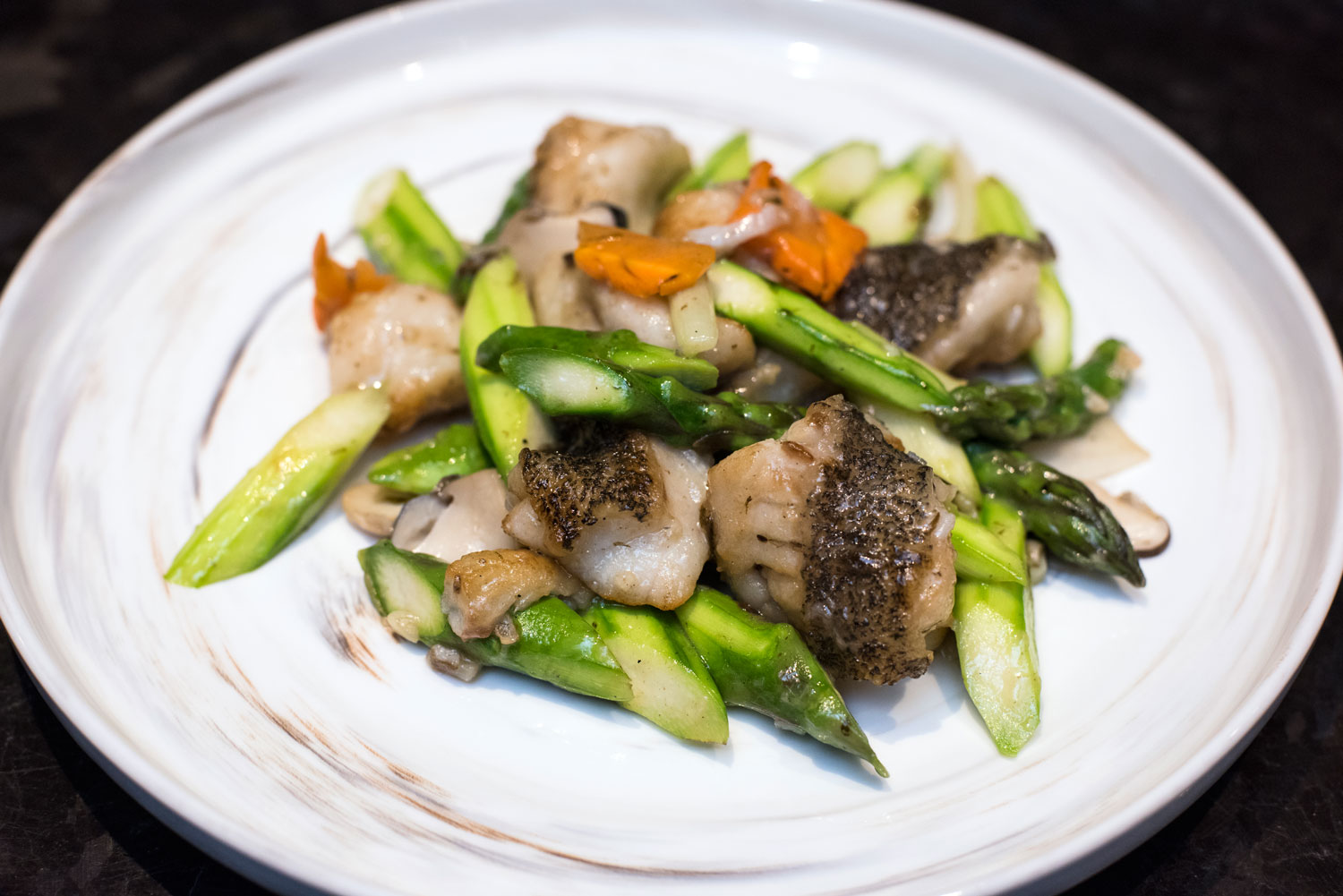 Olive vegetable stir fried with fresh pearl grouper Fillet is a dish well received by diners of all ages. 