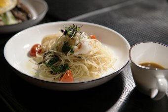 Maine Lobster and Capellini served with aromatic lobster