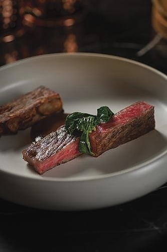 Miyazaki Wagyu with layered yam and sambal hitam.