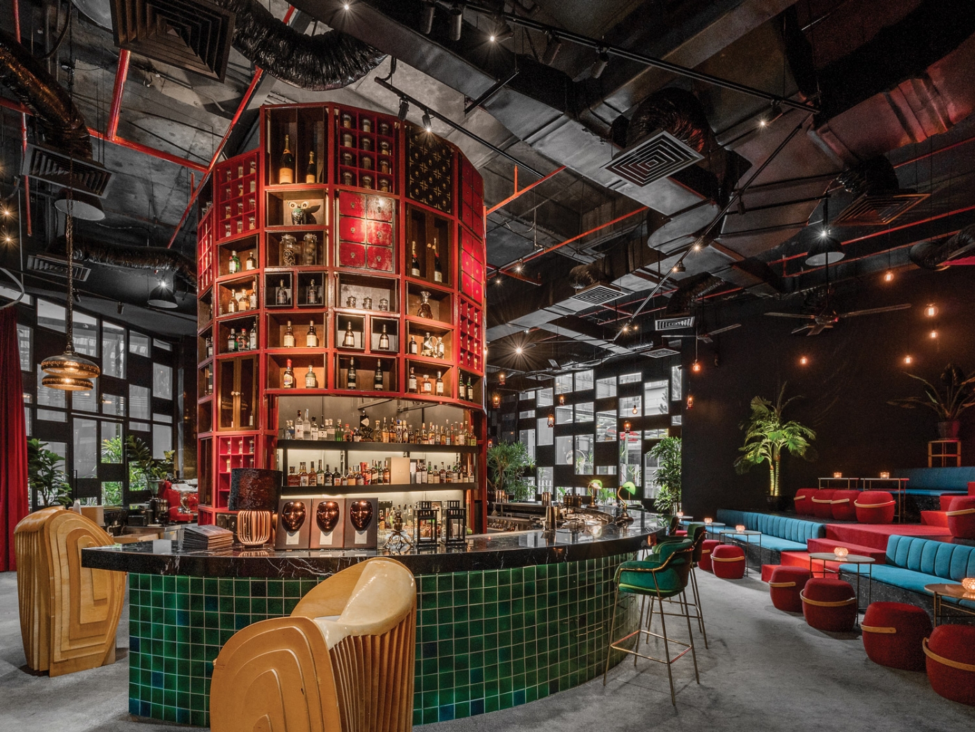 At the center of these three ‘regions’ are the circular bar and a layered staged drinking space perfect for events and people-watching corners.