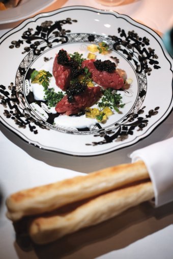 I love the plating of the dishes. My friend said the beef was delicious, but couldn’t take their eyes off the “skinny and muscular” breadsticks.