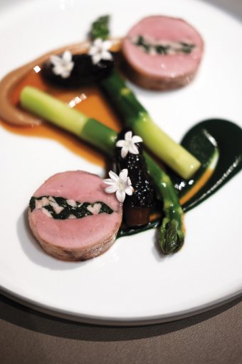 The combination of lamb saddle, asparagus, and morel mushrooms is particularly delicious.