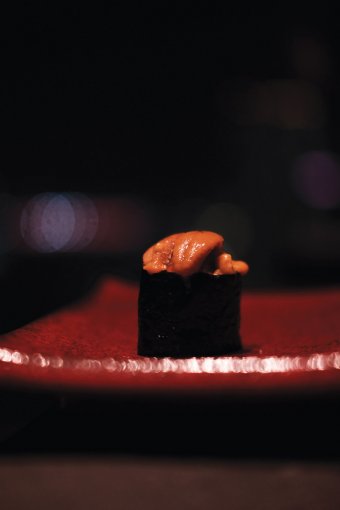 Sea urchin, one of the seven sushi pieces in the chef’s Omakase menu, is a must-try dish.
