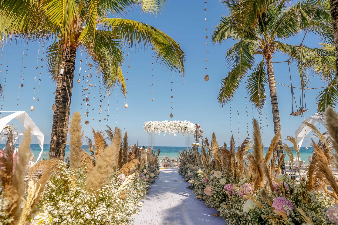 Couples can exchange their vows at Khem Beach, one of Vietnam’s most stunning stretches of sand, at JW Marriott Phu Quoc Emerald Bay Resort & Spa
