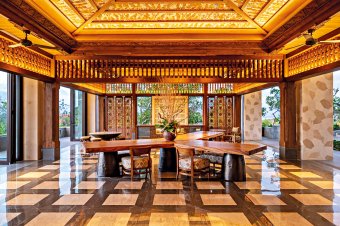 The lobby at AYANA Segara is adorned with intricate Balinese wood carvings and classic Kamasan paintings on the ceiling, creating a calm and sophisticated atmosphere that reflects the brand’s deep respect for local culture.