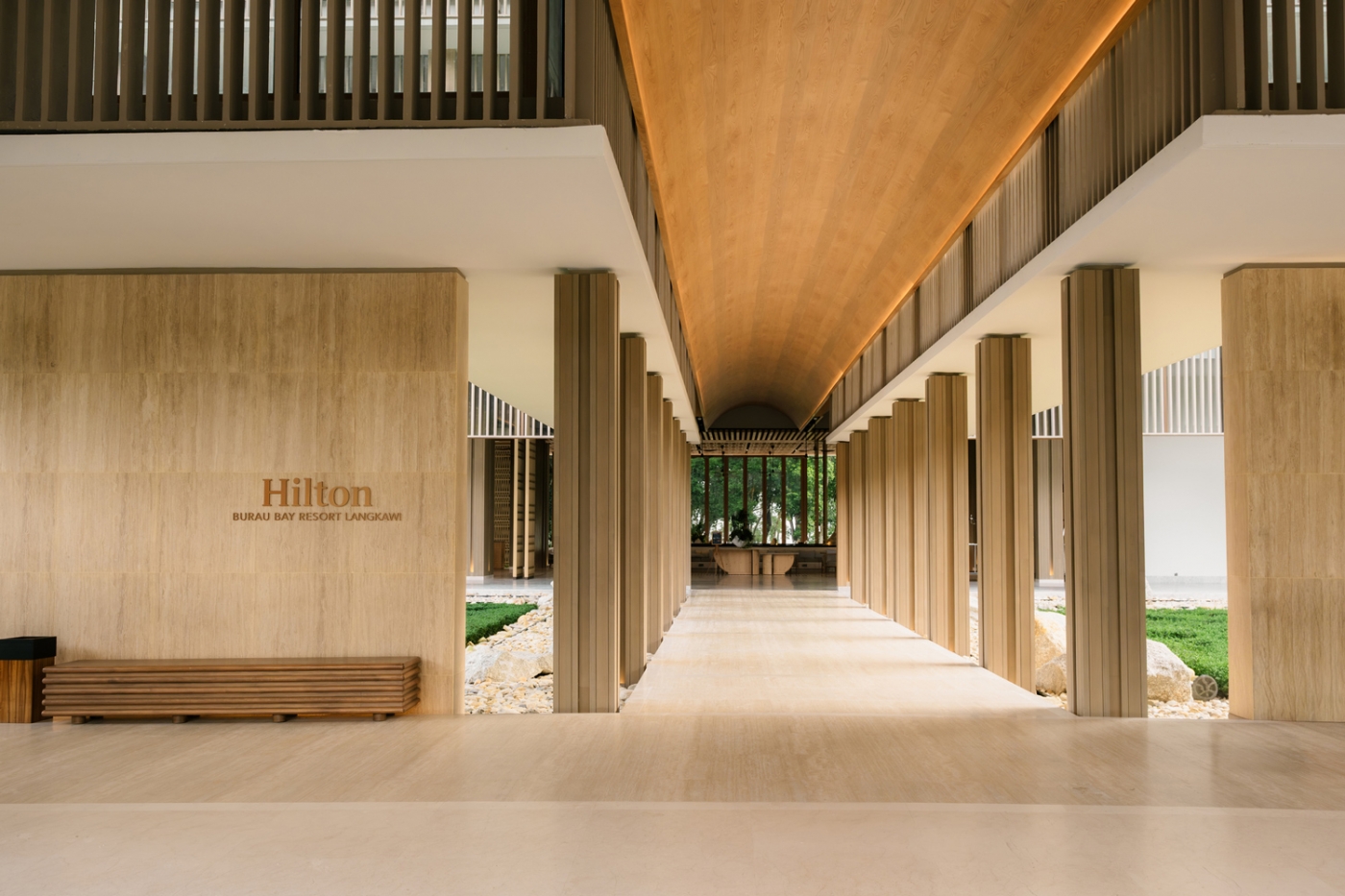 Where warm natural materials and a framed arrival sequence set the tone for the journey within.